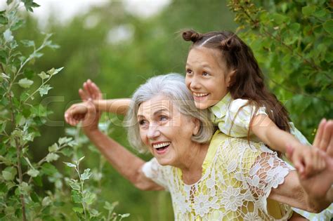 portrait of grandmother and granddaughter stock image colourbox