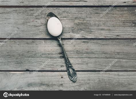 egg  silver spoon stock photo  cy boychenko