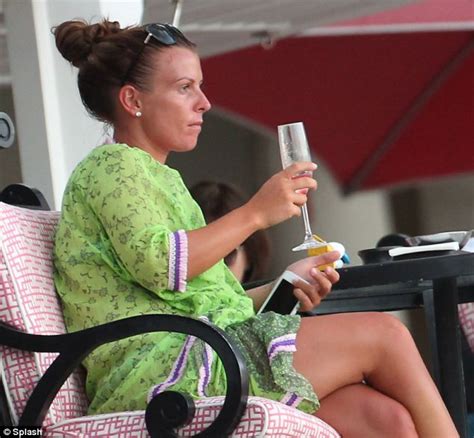 coleen rooney kicks back with a cocktail as she enjoys