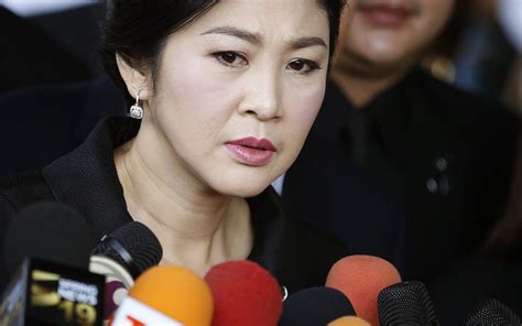 ousted thai prime minister yingluck shinawatra sentenced in absentia to