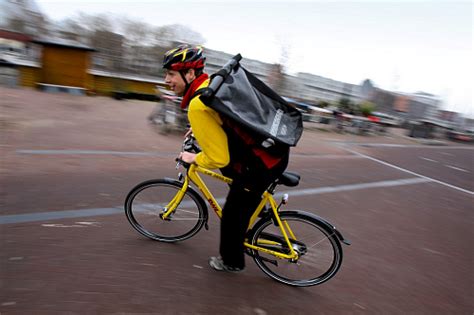 dhl express  green delivers  bike   dutch cities