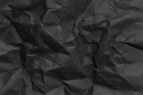 crumpled black paper texture  stock photo  vecteezy