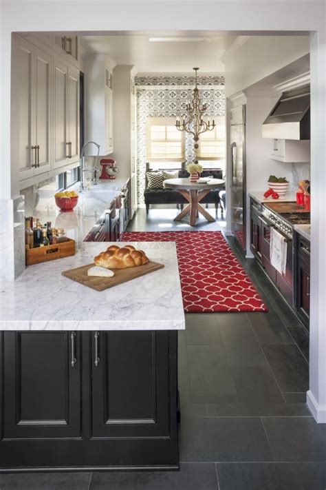 transitional galley kitchen  white marble countertops hgtv