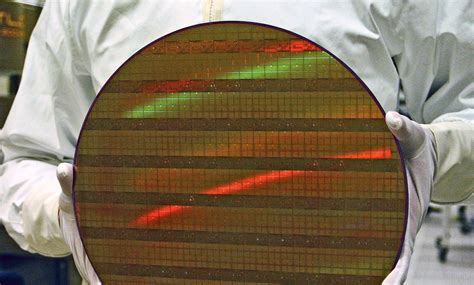 intels chip manufacturing  mm wafers delayed   due