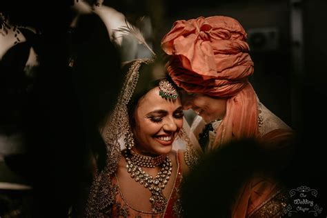 a pretty delhi wedding in peachy tones with the couple in coordinated