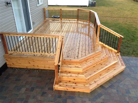 cedar deck  corner wrap  steps      good size   backyard