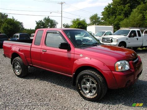 nissan frontier xe king cab   molten lava red pearl photo