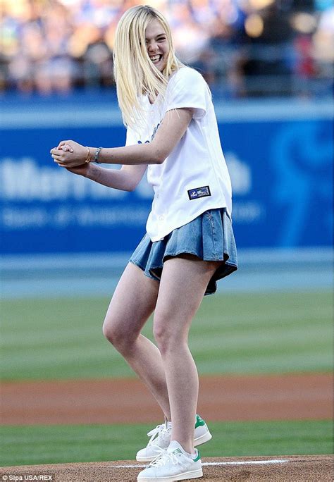 elle fanning is a natural as she throws first pitch at dodgers game