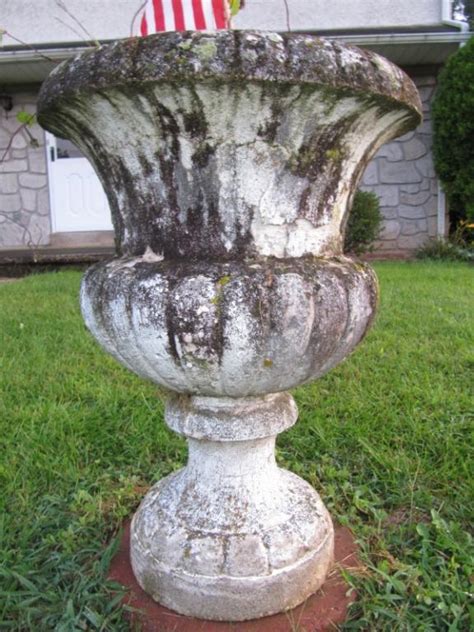 Painting outdoor cement flower pots - DoItYourself.com