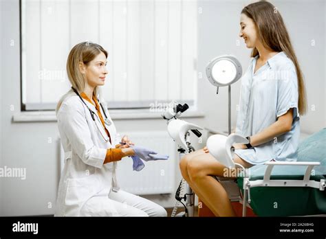 Gynecologist Preparing For An Examination Procedure For A Pregnant