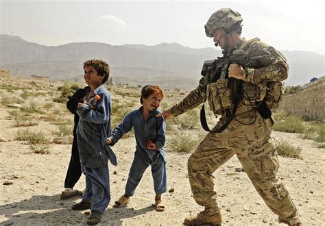 fileus soldier plays  afgan kidjpg wikimedia commons