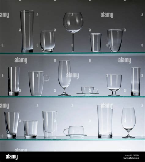 A Collection Of Various Types Of Drinking Glasses Arranged Neatly On