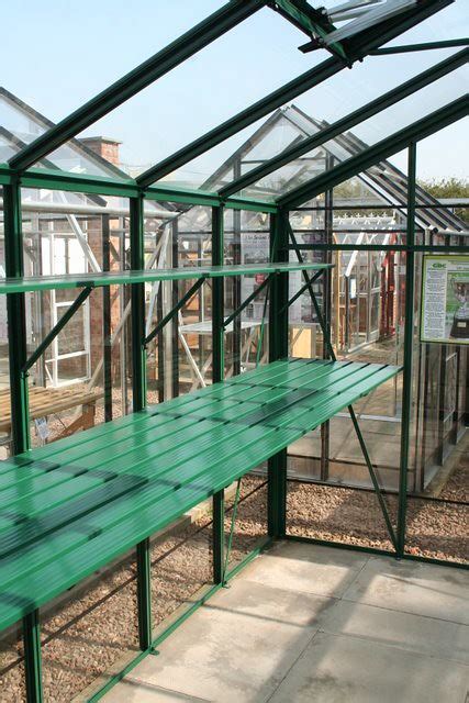 metal greenhouse staging  garden feature image    flickr