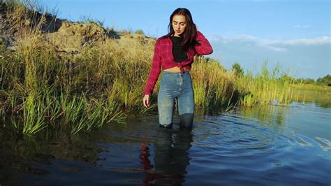 Wetlook By Brunette Girl In Soaking Wet Jeans Shirt And Sneakers
