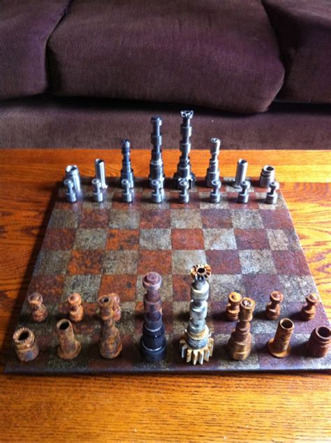 i made this chess set from old transmission parts half of the pieces i left outside to rust