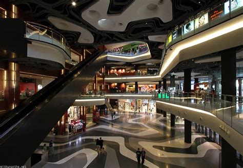 escalator   shopping mall  people walking