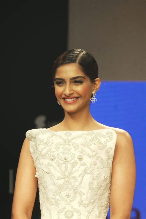 high quality bollywood celebrity pictures sonam kapoor looks irresistibly sexy in white dress