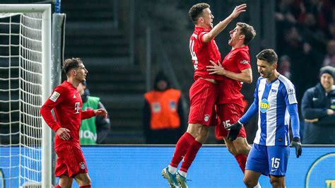 bayern munich beats hertha berlin away to move to second