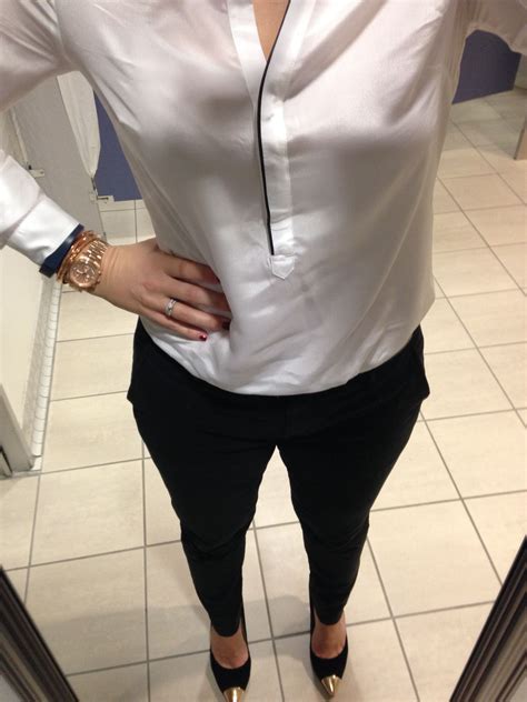 white silk blouse black pants black and gold tipped