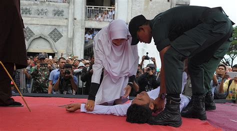 indonesian man collapsed during a public flogging revived