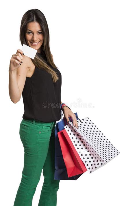 happy cute young woman shopping  color bags isolated stock photo
