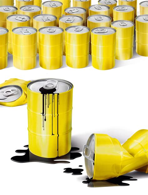 yellow cans  black liquid stock images