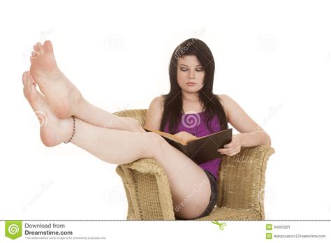 Woman Purple In Chair Read Legs Up Stock Image Image