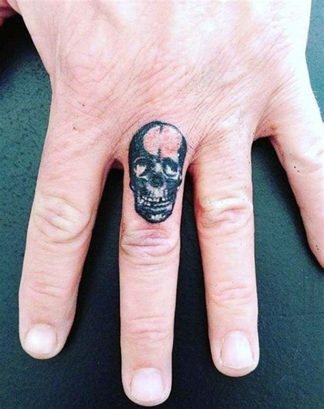 attractive finger tattoos  men