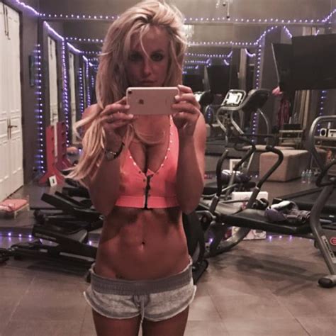 britney spears shows off her tiny waist as she does the splits in impressive gym session