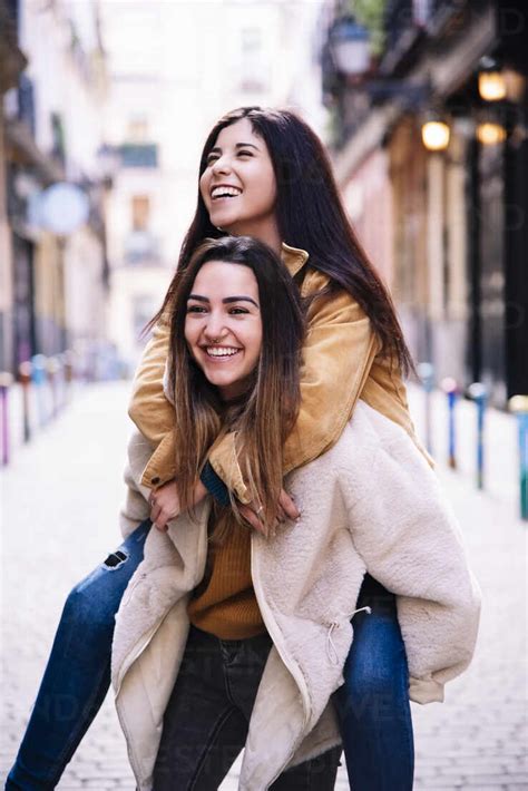 beautiful lesbian couple having fun at the street lgbt concept