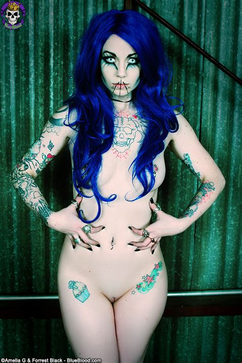 blue haired wild and tattooed gothic babe pichunter