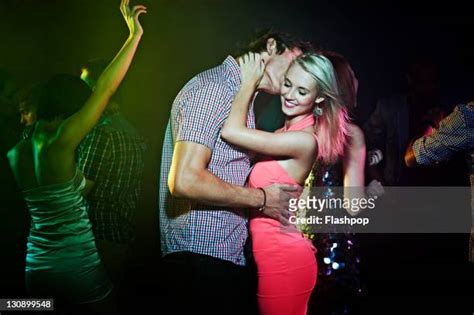 Couples Making Out In A Nightclub Photos And Premium High Res Pictures