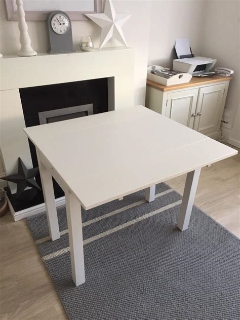 small white dining table  ikea extends  heath cardiff gumtree