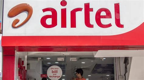 bharti airtel posts record loss  making provision  pay rs