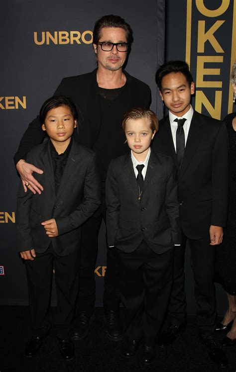 pics brad pitt brings kids  unbroken premiere star magazine