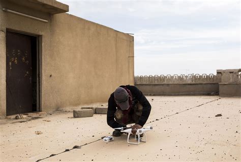 djis  fly zone software stop isis  weaponizing drones mit technology review