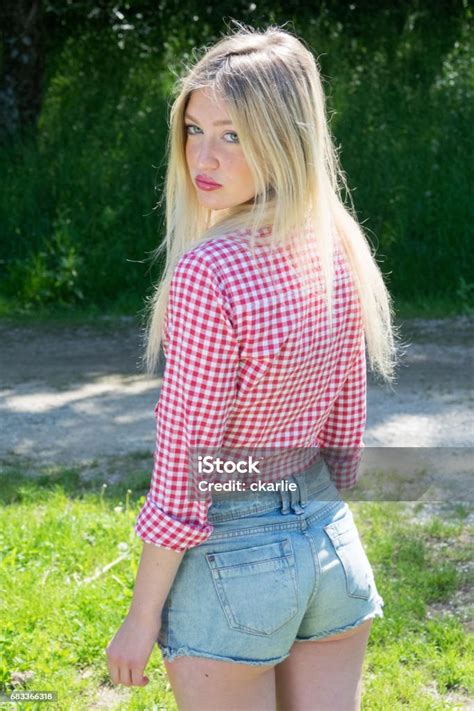 Young Blonde Woman In Park Cute Teenage Girl Outdoors Mild Retouch 71c