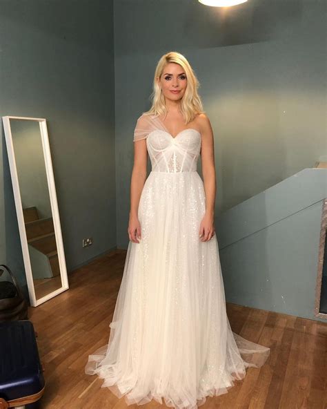holly willoughby stuns fans with rare wedding dress photo