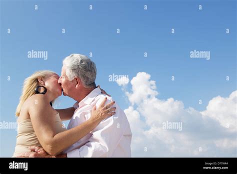 Elderly Couple In Love Honeymoon With Old Man And Woman Kissing Copy