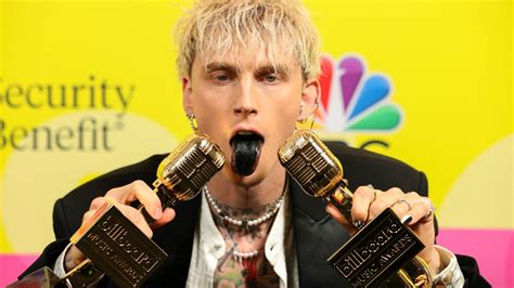 Machine Gun Kelly S Style Team Explains Why He Painted His Tongue Black