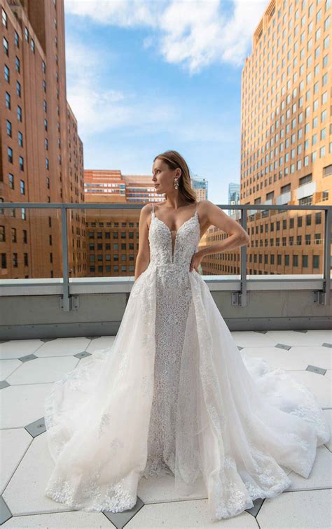 sleek fit and flare beaded wedding gown with overskirt