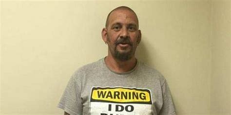 accused burglar arrested wearing warning i do dumb things t shirt
