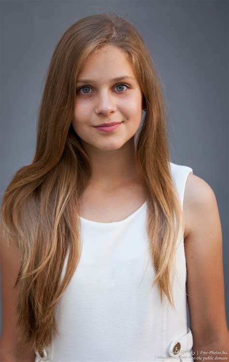 Photo Of A 12 Year Old Blond Girl Wearing A White Dress Photographed In