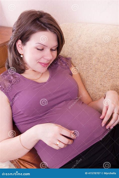 Young Pregnant Brunette Woman Relaxing Stock Image Image Of Home