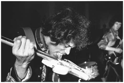 Jimi Hendrix Playing Guitar With His Tongue Jimi Hendrix