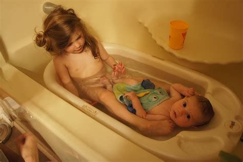 brother and sister taking a shower