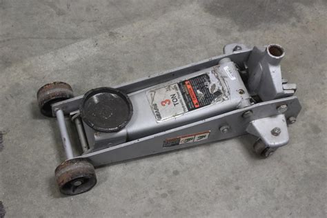 sears   ton hydraulic floor jack property room