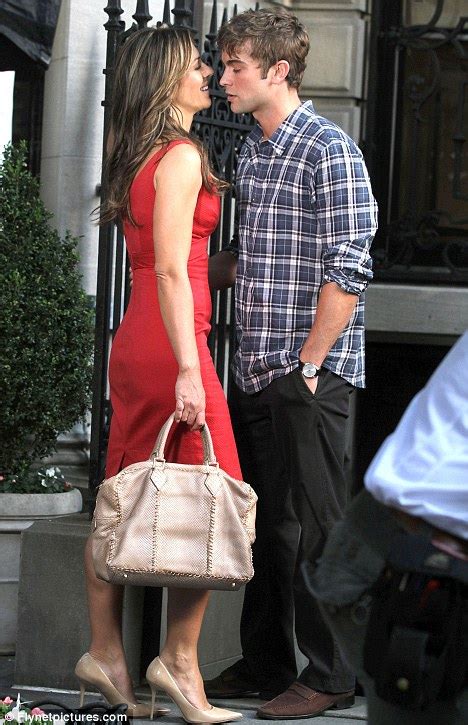 elizabeth hurley locks lips with 25 year old gossip girl star chace crawford daily mail online