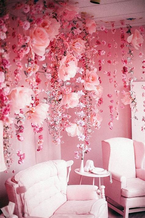 living room  pink flowers hanging   ceiling   white