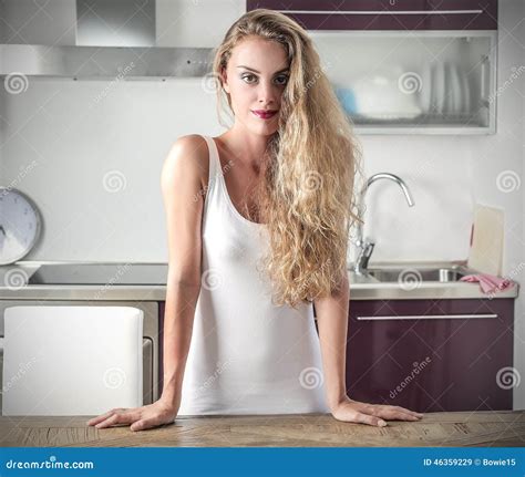 Blonde Girl In The Kitchen Stock Image Image Of Table 46359229